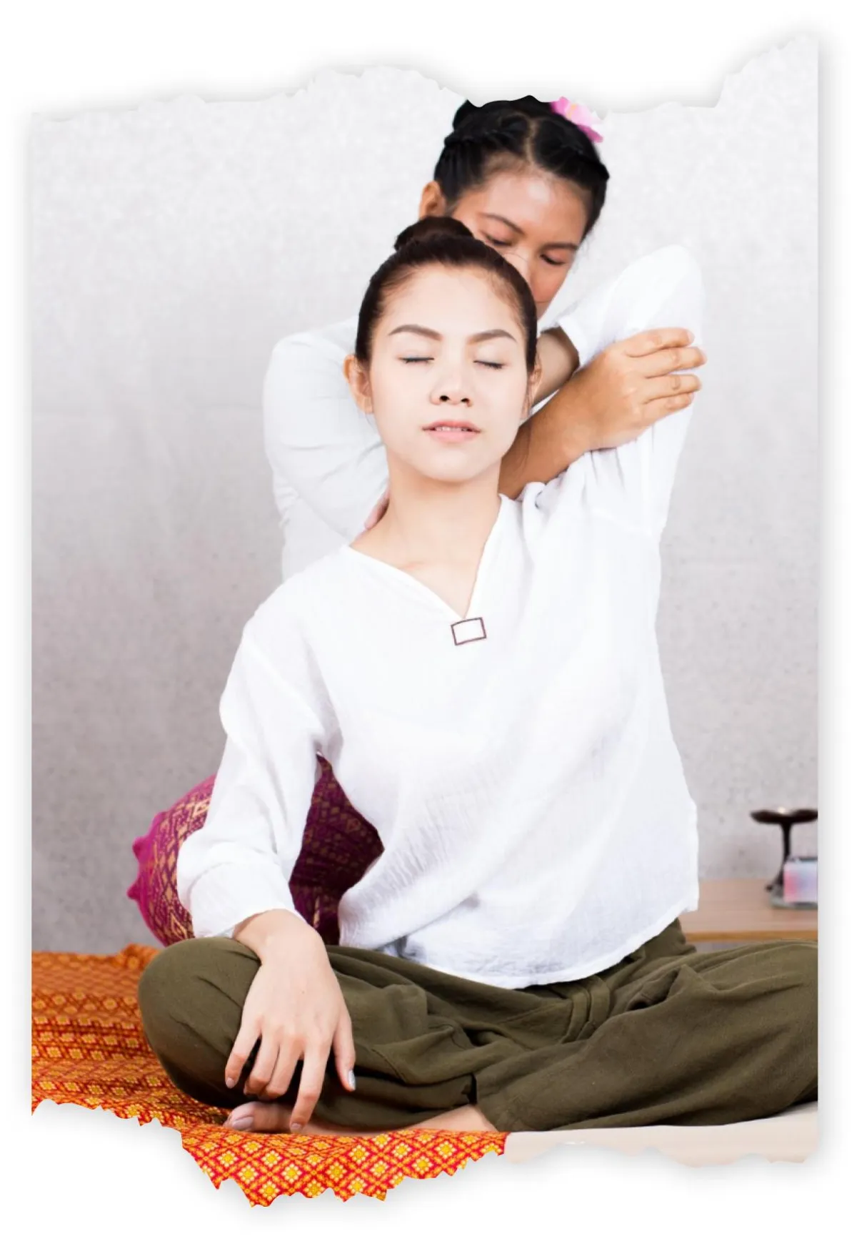 tmp8dy81nf8 Woman receiving traditional Thai massage therapy.